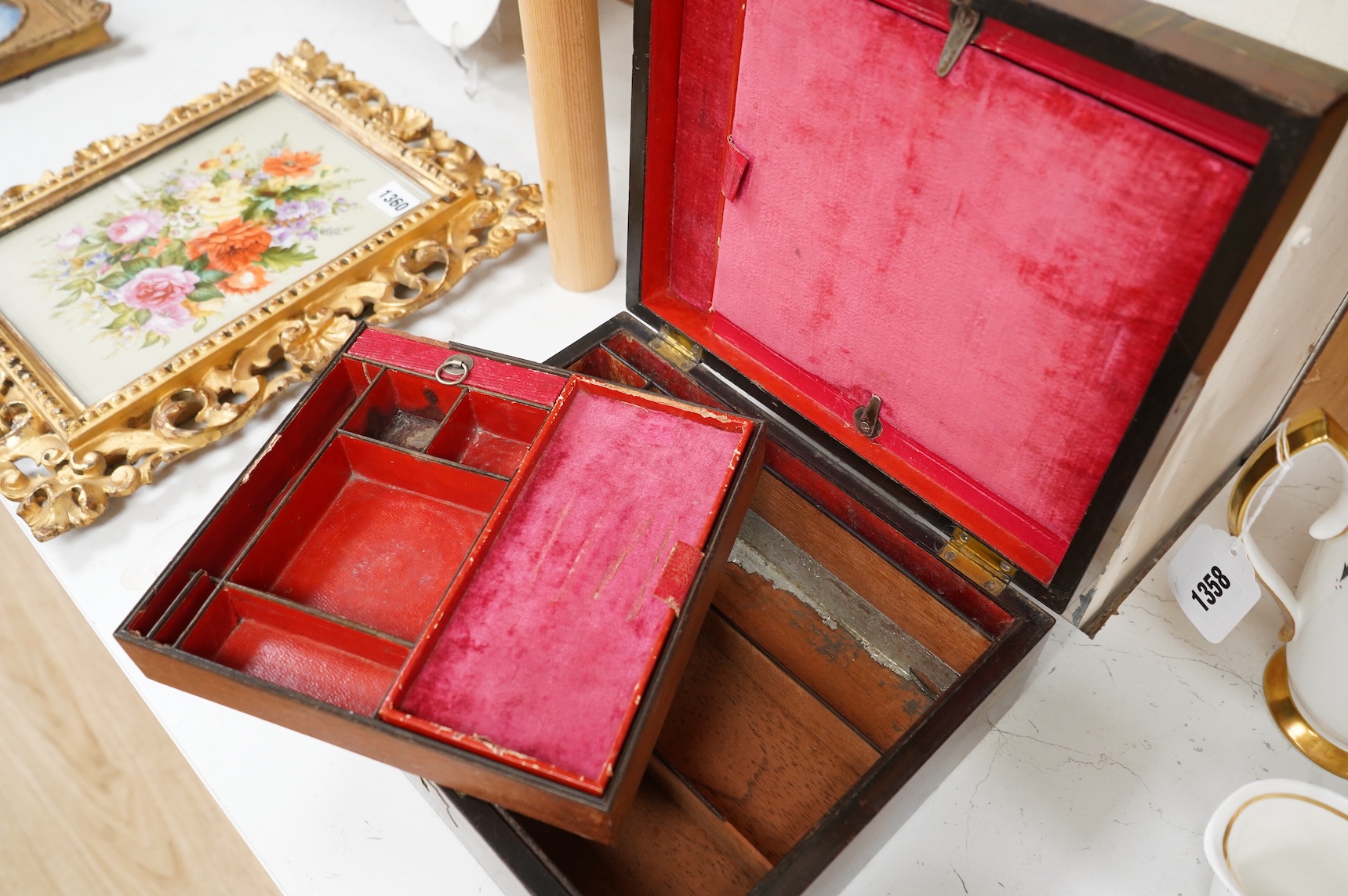 A George IV mahogany and brass bound campaign vanity box with original fittings, 27cm wide x 23cm deep x 10cm high